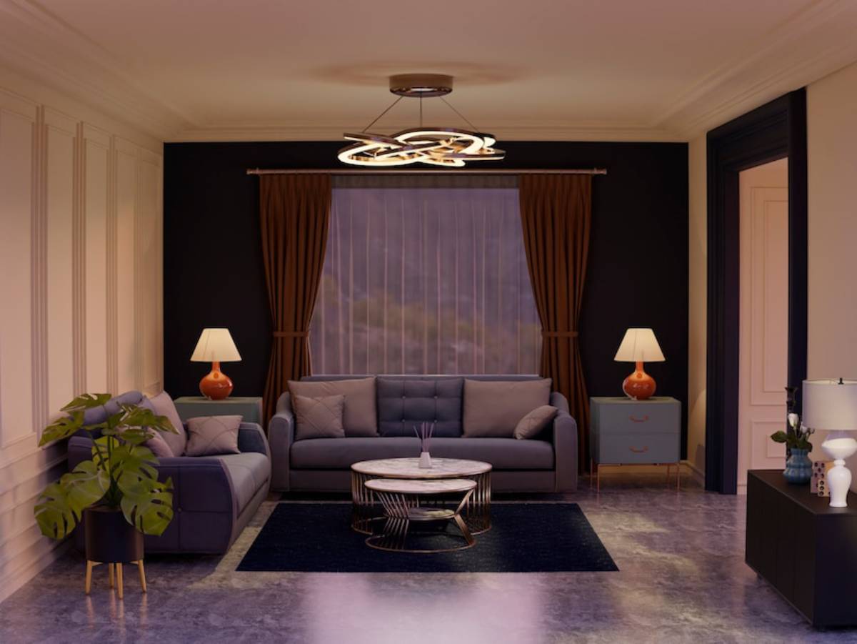 Elegant living room with a grey sofa, armchairs, stylish lamps, and a circular ceiling light, accented by rich curtains and indoor plants. 